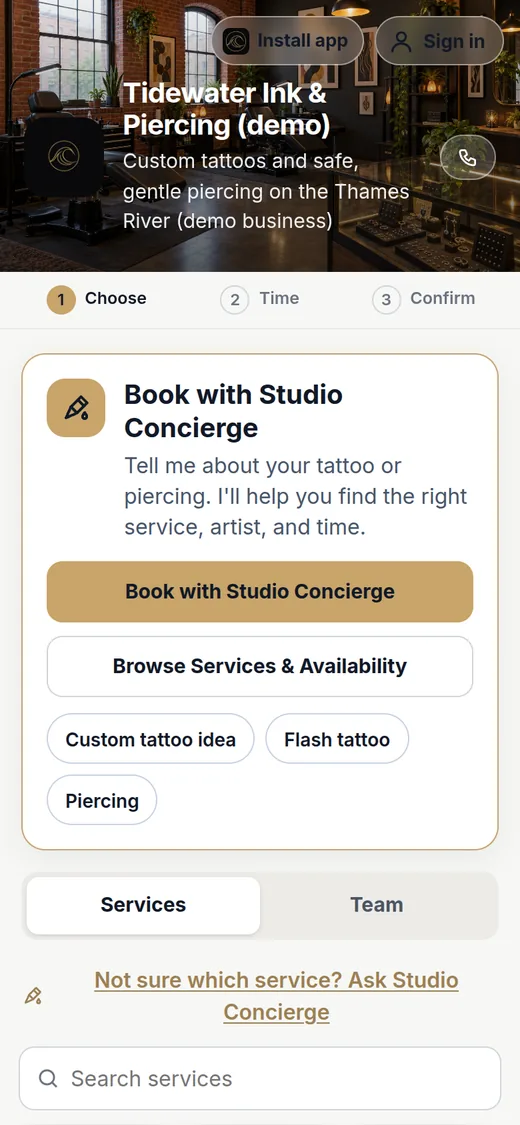 Tidewater Ink & Piercing booking page on a phone with Studio Concierge and custom tattoo, flash and piercing options